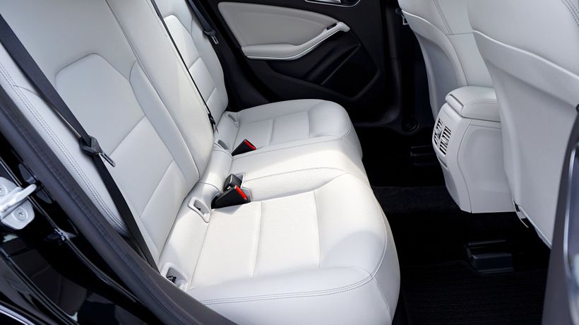 A car seat interior where dust and allergens collect