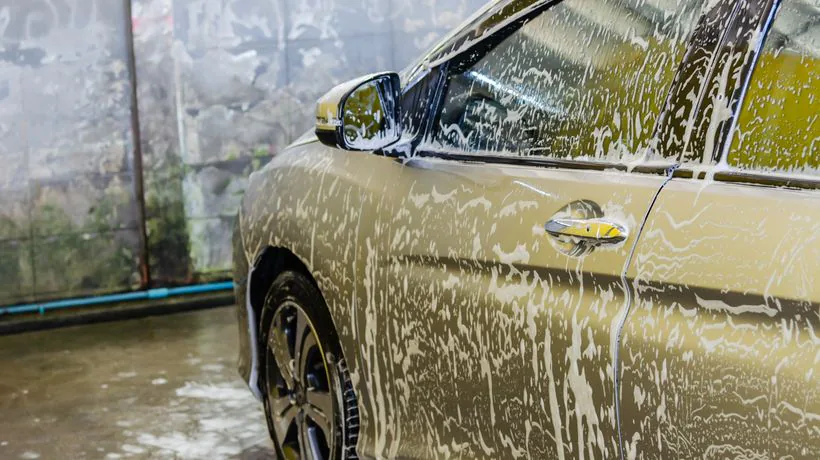 Washing a car by hand at home