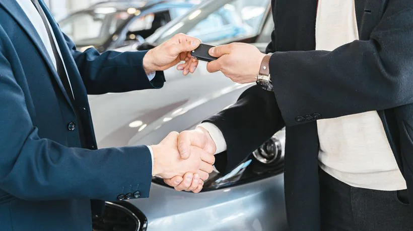 A glossy, well-protected car presented for resale
