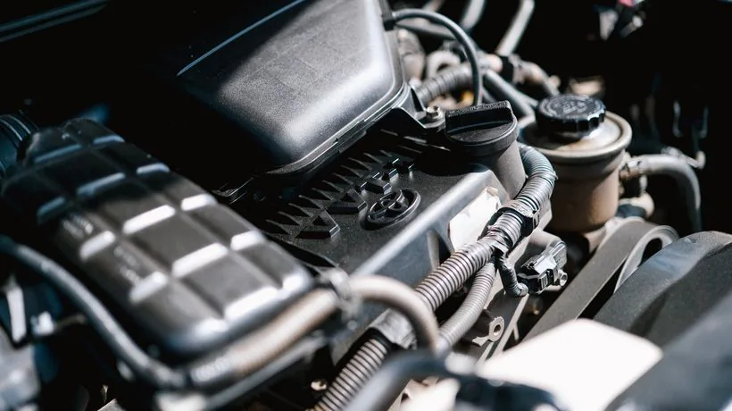 A car engine bay cleaned safely