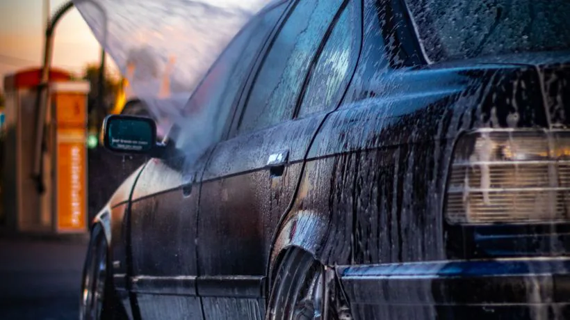 Comparing a professional valet with an automatic car wash subscription