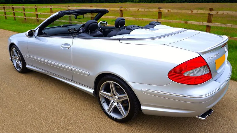 A convertible car with a soft top that needs regular care