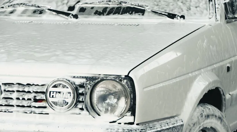 Washing a car using a safe two-bucket method