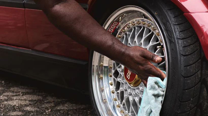 Cleaning an alloy wheel to remove baked-on brake dust