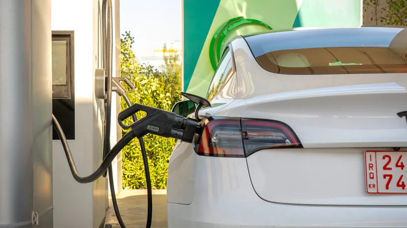 An electric car charging, valeted with EV safe methods